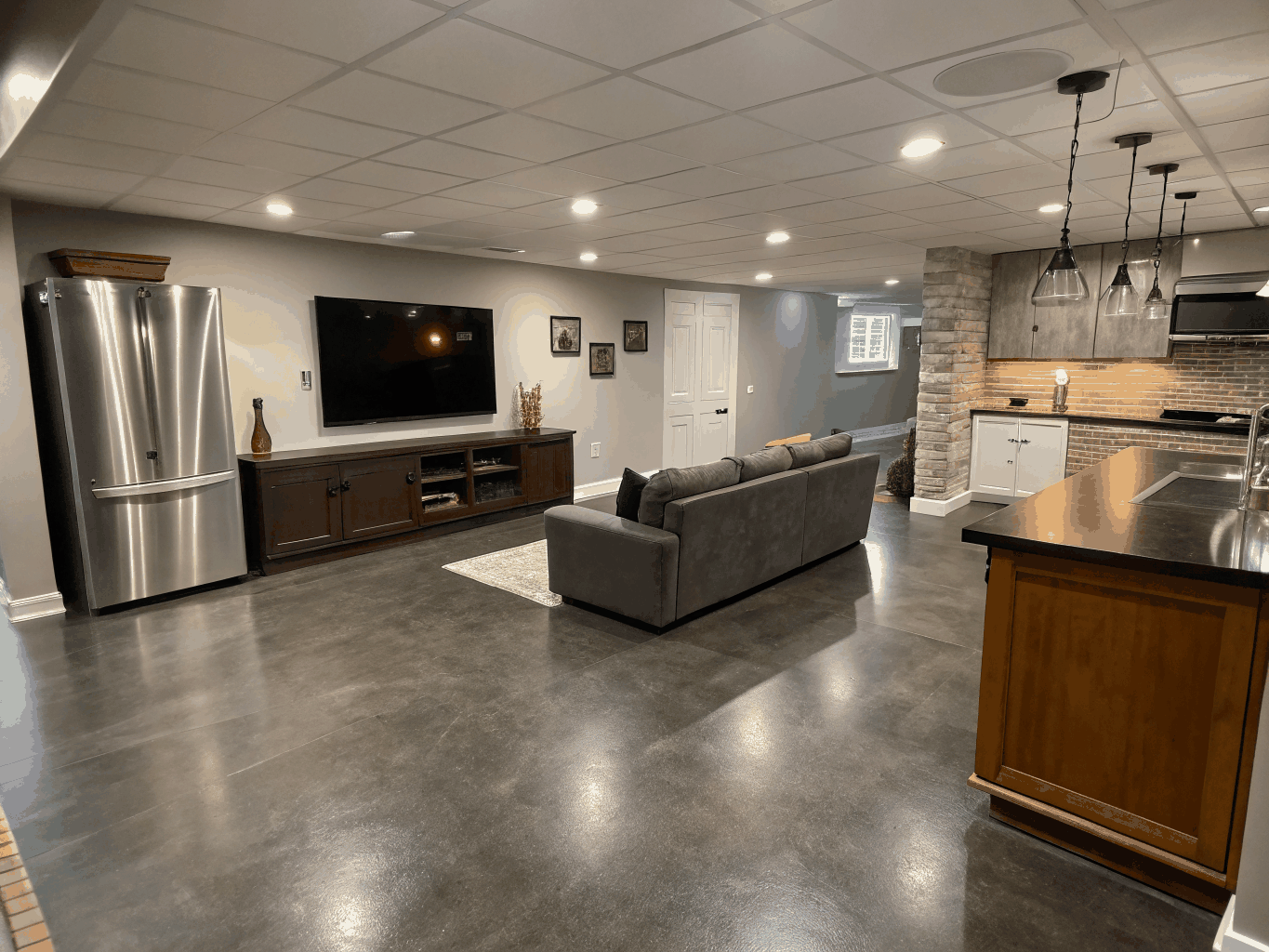 Finished basement with luxury entertainment wet bar in Marietta GA